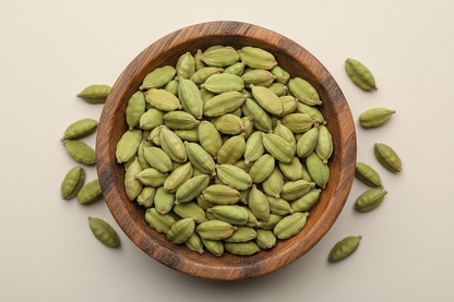 Green Cardamom in wooden bowl 